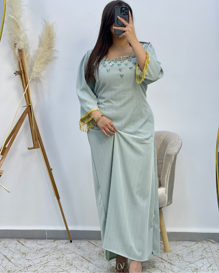 فستان لمسة الذهب