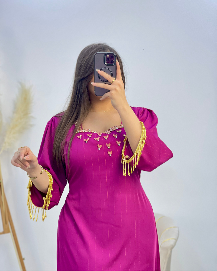 فستان لمسة الذهب