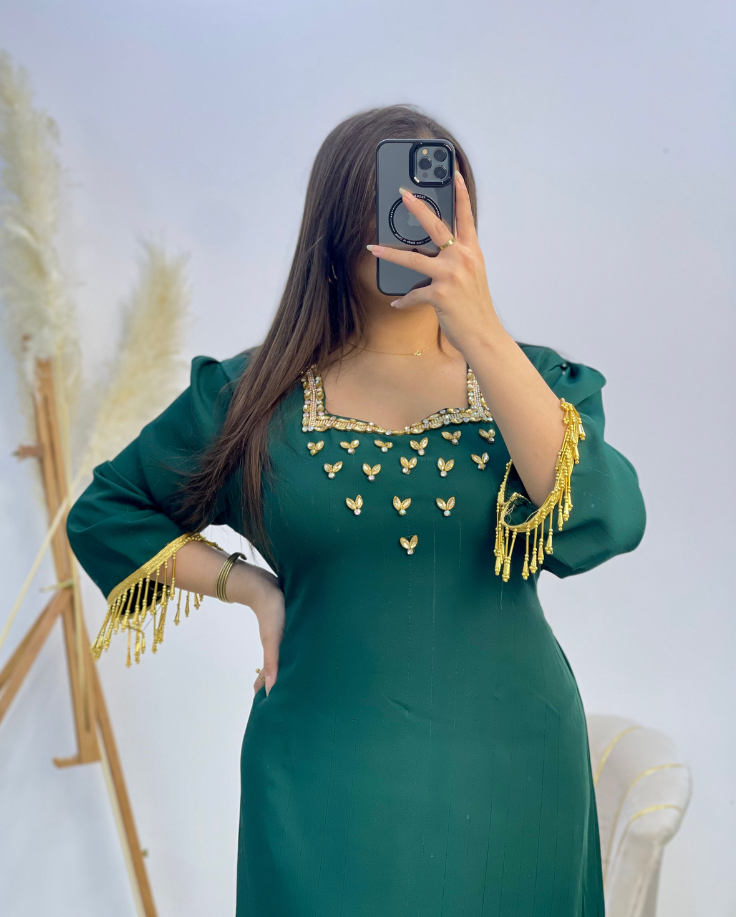فستان لمسة الذهب