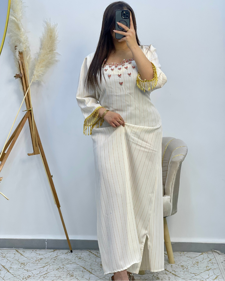 فستان لمسة الذهب